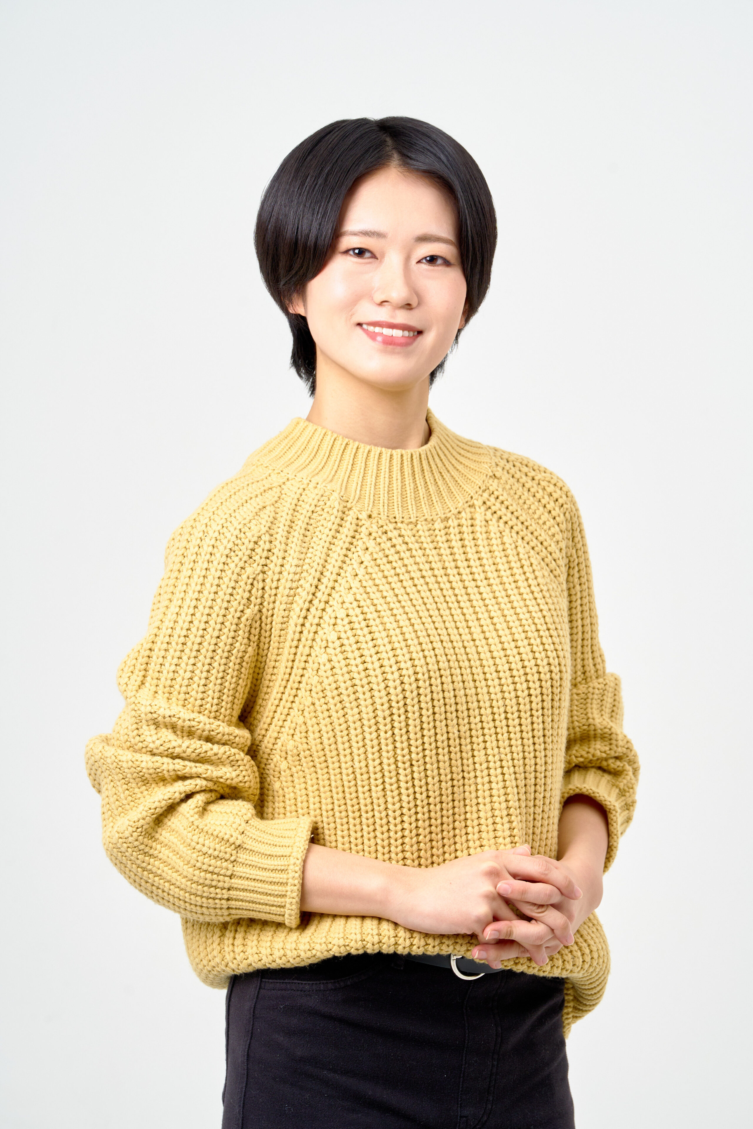 宣材写真の撮影です。黄緑色の衣装に合わせ